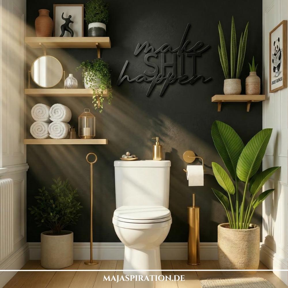 Moderne Gäste WC Idee mit humorvollem Schriftzug und schwarzer Wand.